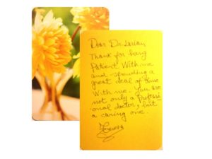 patient testimonial for Dr. Larian with yellow flowers